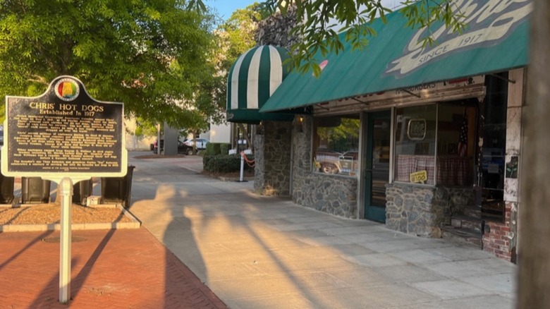 Exterior of Chris'sHot Dogs with historic marker