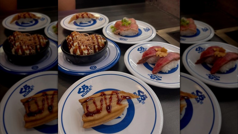 Assorted saucers of sushi