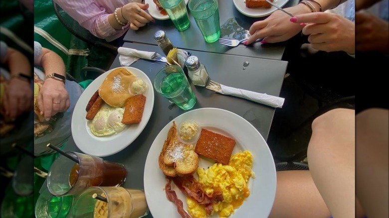 Breakfast plates: eggs, hashbrowns and bacon