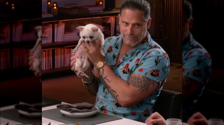 David Chang standing at the counter in his kitchen