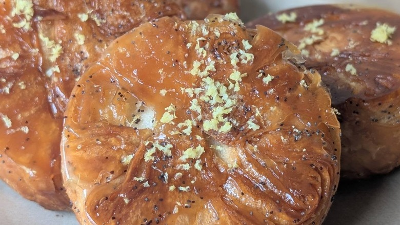 Three Kouign Amann pastries close up