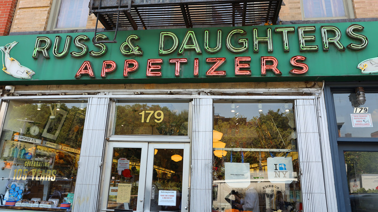 Exterior and neon sign of Russ & Daughters location in NYC