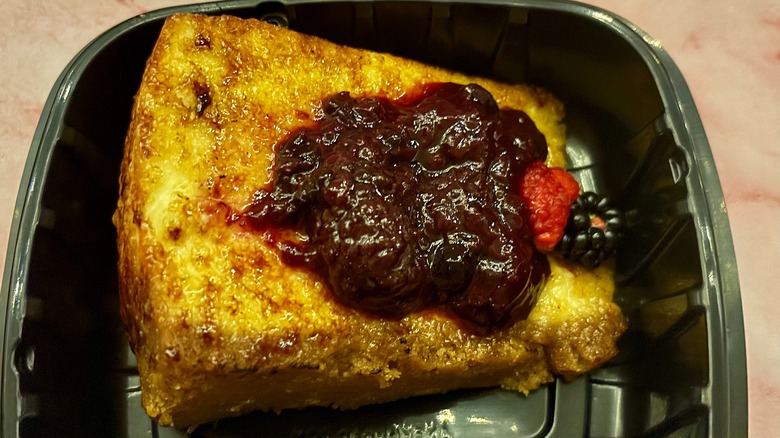 Cheesecake brulee from Fogo de Chao in black takeout box