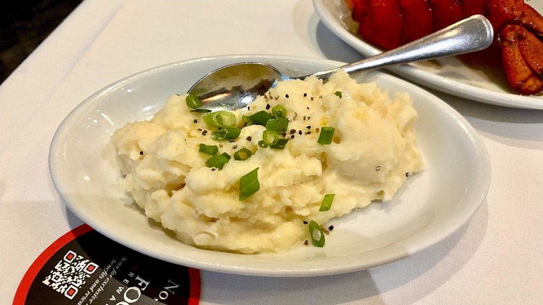 Bowl of garlic mashed potatoes on table at Fogo de Chão