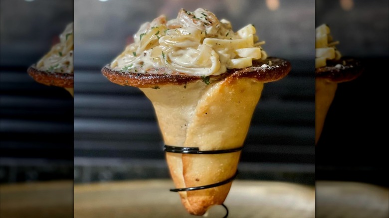 fettucine Alfredo in garlic bread cone
