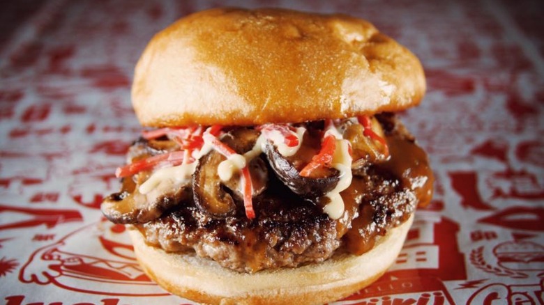 Burger with mushrooms on Fuku Burger paper