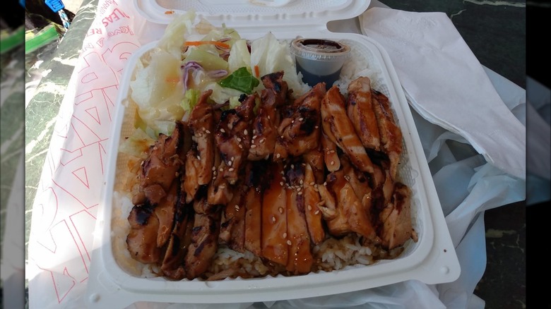 Chicken teriyaki in a takeout container