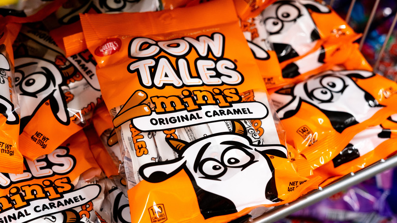 Orange candy bags of Cow Tales Mini Original Caramels.