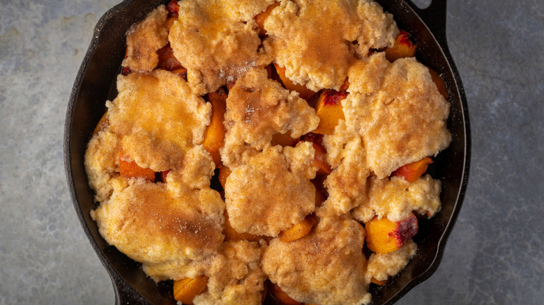 Peach cobbler in a cast-iron skillet