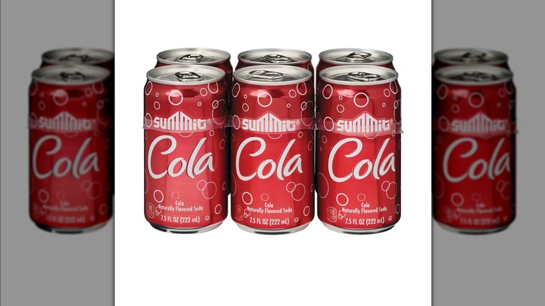 Summit cola cans on a white background