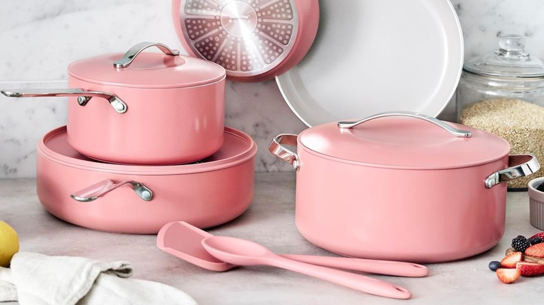 GreenPan Nova cookware set in coral in a kitchen.