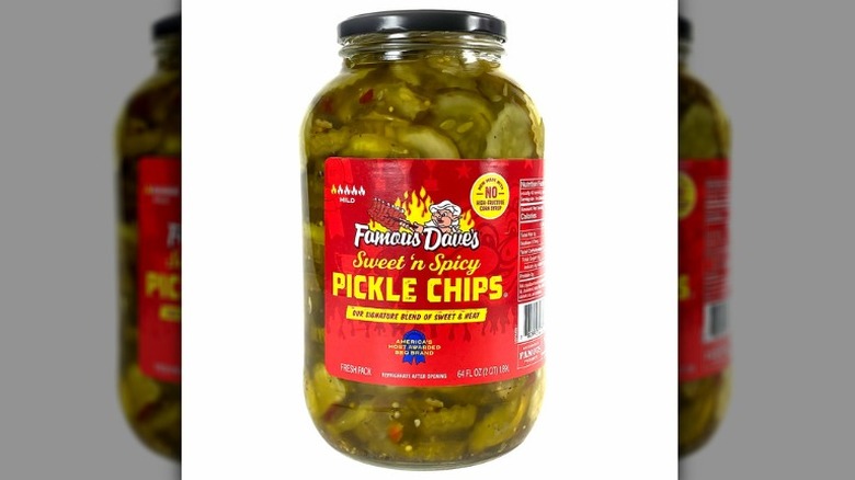 A large jar of Famous Dave's sweet 'n spicy pickle chips on a white background