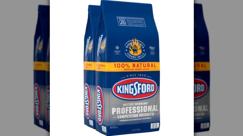 A 2-pack of Kingsford professional competition briquets in blue bags on a white background