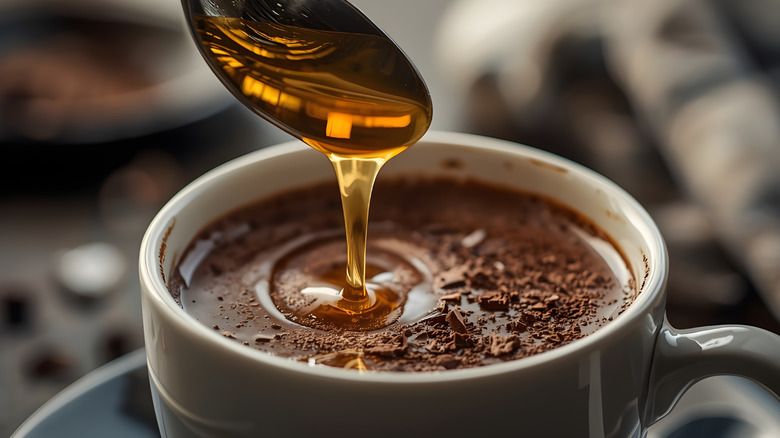 honey poured into hot chocolate