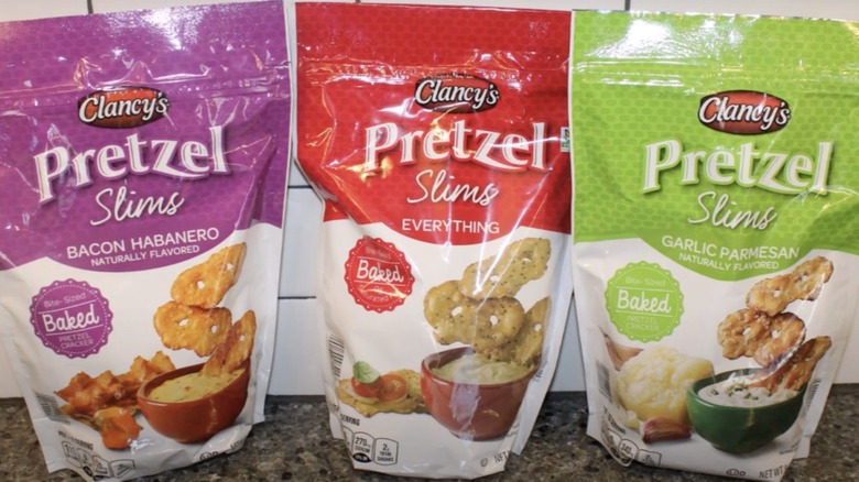 Three varieties of Clancy's pretzel Slims lined-up side by side.