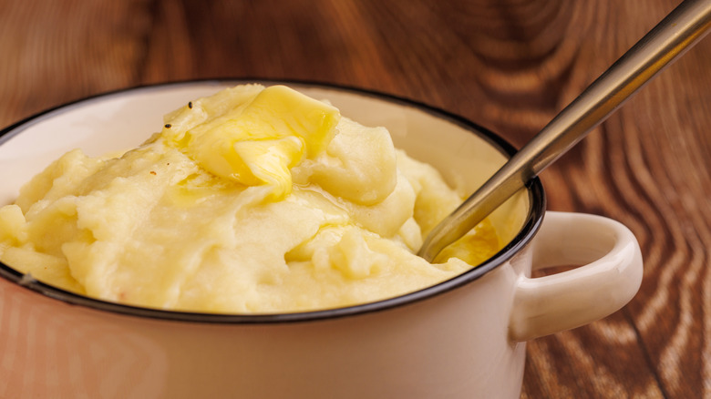 close up of creamy mashed potatoes in a pot