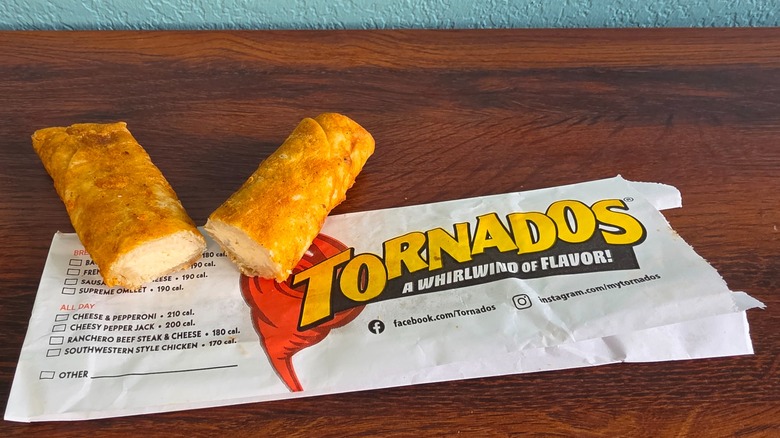 Halved pepper Jack cheese Tornado on top of wrapper