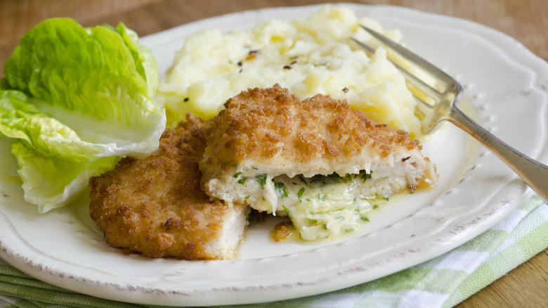 Chicken Kiev and mashed potatoes on a plate