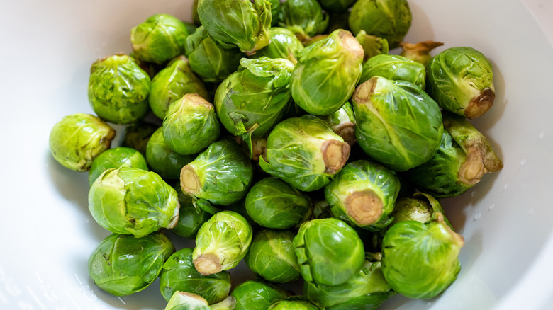 Raw Brussels sprouts in bowl