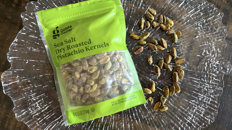 Good & Gather sea salt dry roasted pistachio kernals in bag and scattered on clear platter