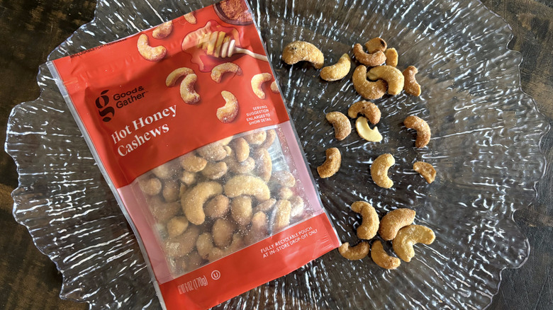 Good & Gather hot honey cashews in bag and scattered on clear platter