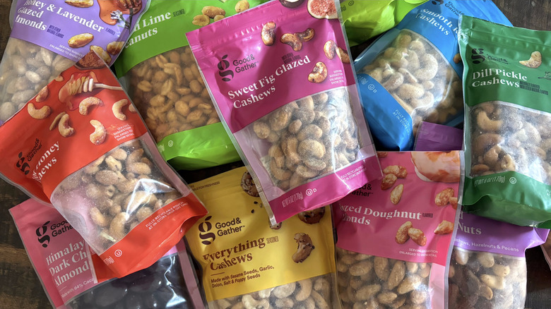 Good & Gather flavored nuts variety of packages on wooden background