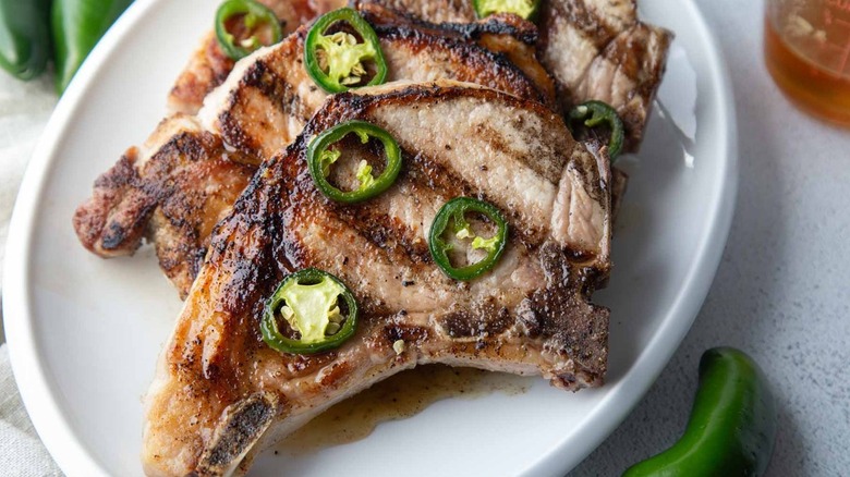 Pork chops with jalapeño slices