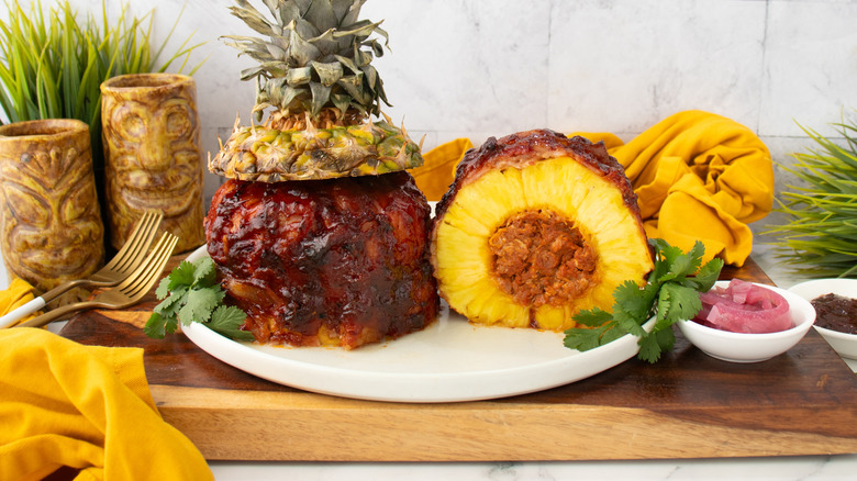 Pork-stuffed pineapple on plate