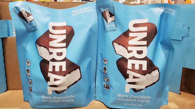 Unreal dark chocolate coconut minis on a shelf at Costco