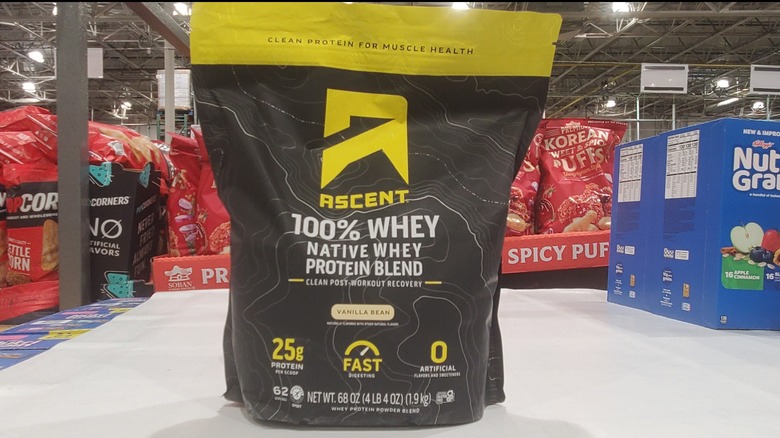 Ascent 100% whey native vanilla bean whey protein blend on a shelf at Costco