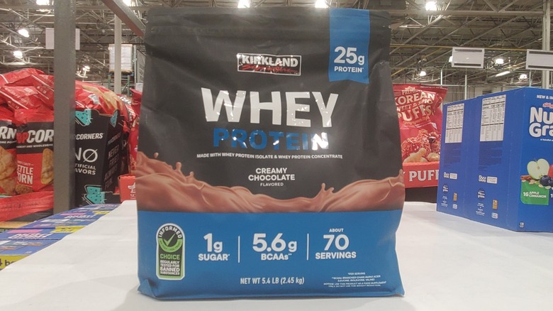 A bag of Kirkland Signature creamy chocolate flavored whey protein at Costco