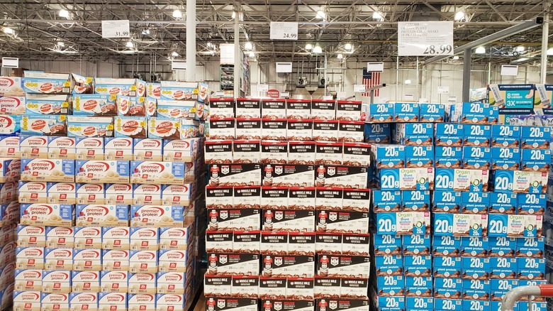 Various stacked boxes of protein shakes at Costco