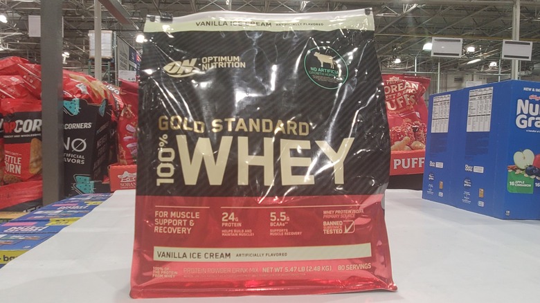 Optimum Nutrition gold standard 100% whey vanilla ice cream flavor on a shelf at Costco