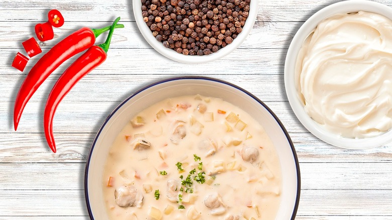 Bowl clam chowder with different toppings