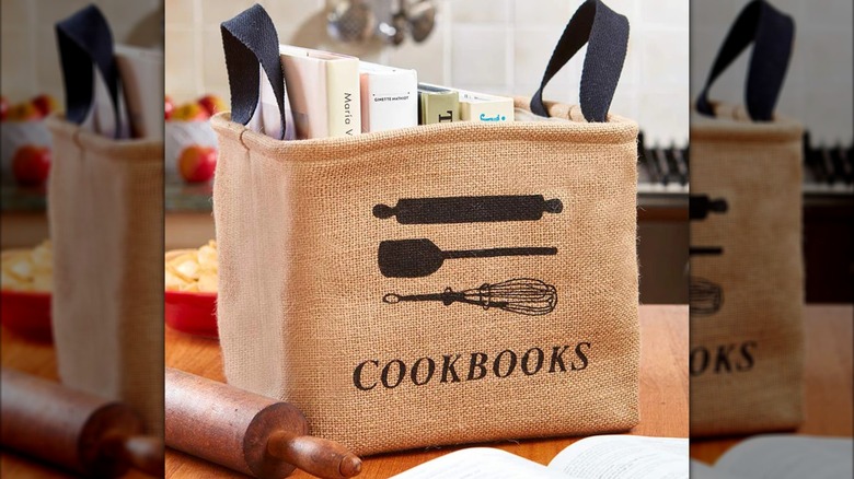 Cookbook storage bin with handles.