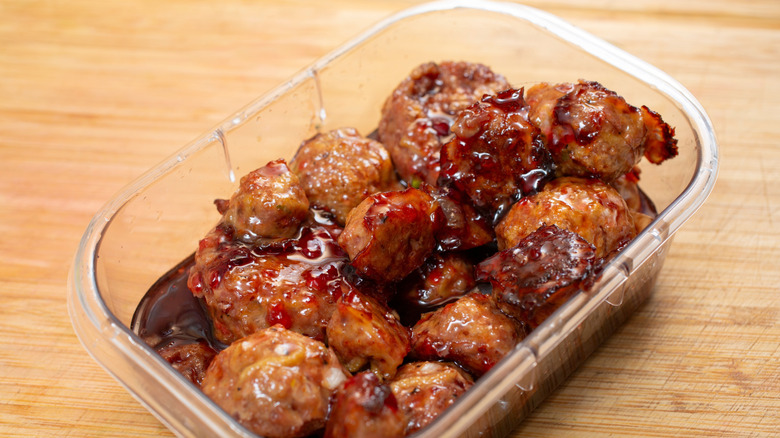 container of grape jelly meatballs