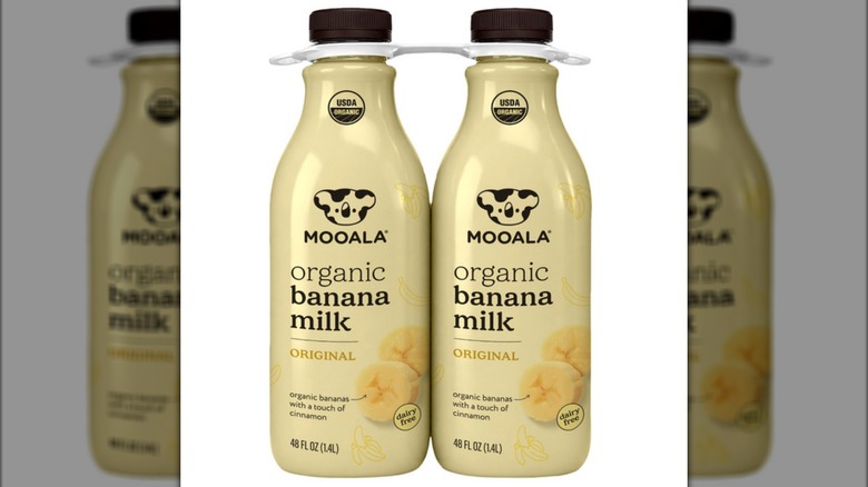 Mooala Organic Banana Milk jugs on white background
