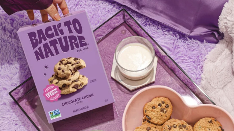 Back To Nature Chocolate Chunk on a table beside cookies