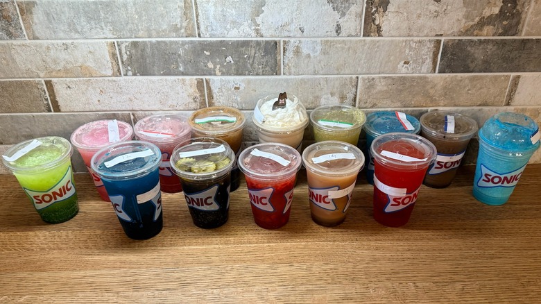 multiple Sonic drinks on a table