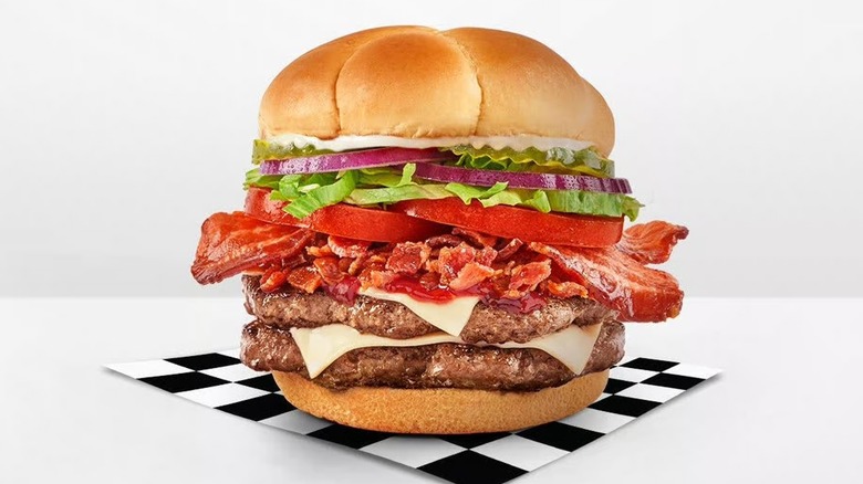 Checkers/Rally's Smoky BBQ Bacon Buford on a checkered napkin and white background
