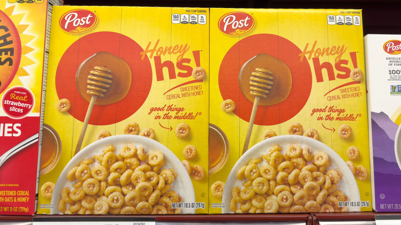 Boxes of Honey Ohs on store shelf