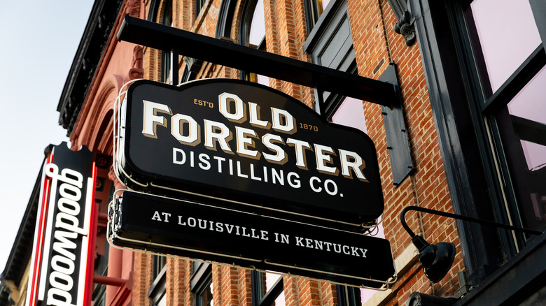 The Old Forester sign hanging outside of its distillery