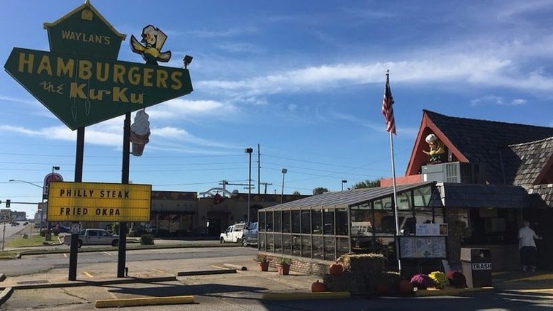 Exterior of Waylan's Ku-ku Burger with sunny blue skiesand vintage signage