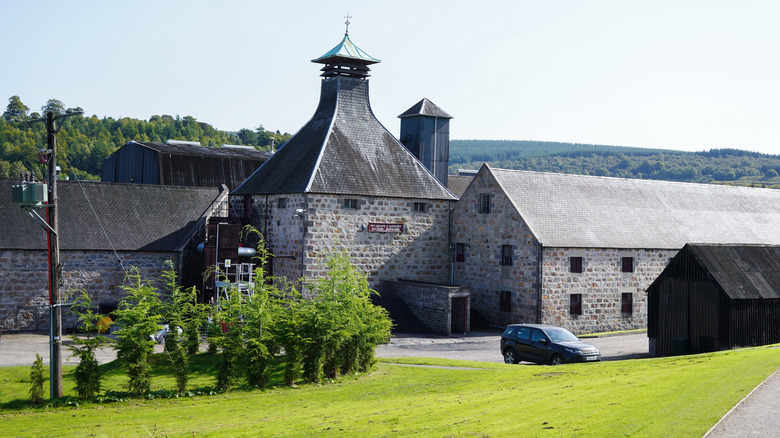 An outside shot of The Balvenie distillery, showcasing its rural Speyside setting