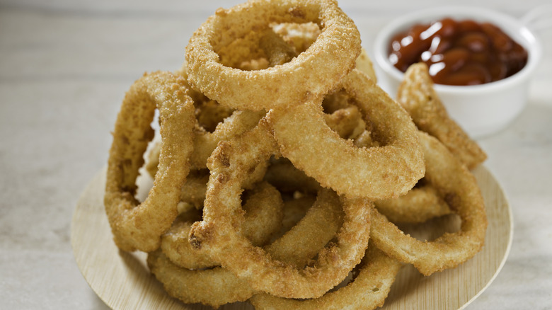 plate piled with onion rings