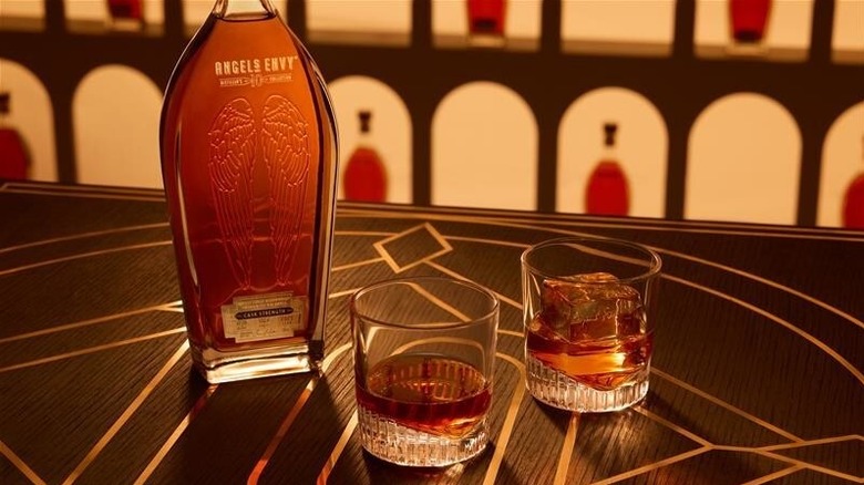Angel's Envy Cask Strength Bourbon bottle with filled glasses