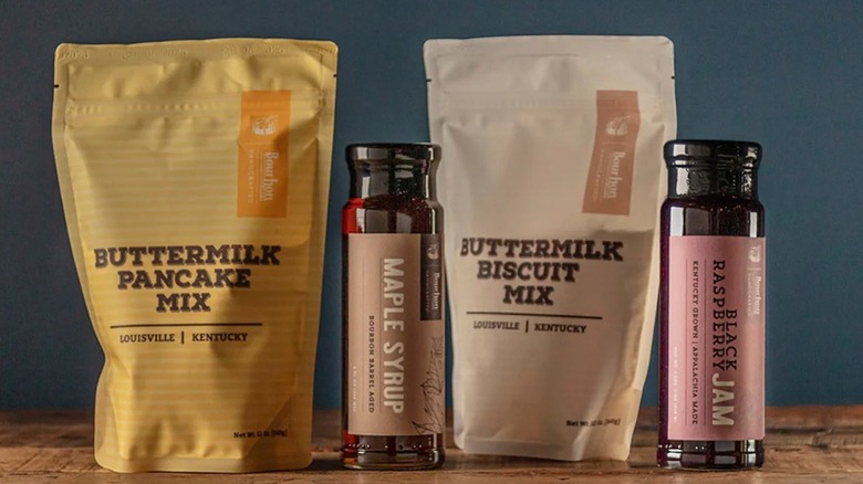 Bourbon Barrel Food's pancake and buttermilk mixes next to jama nd maple syrup
