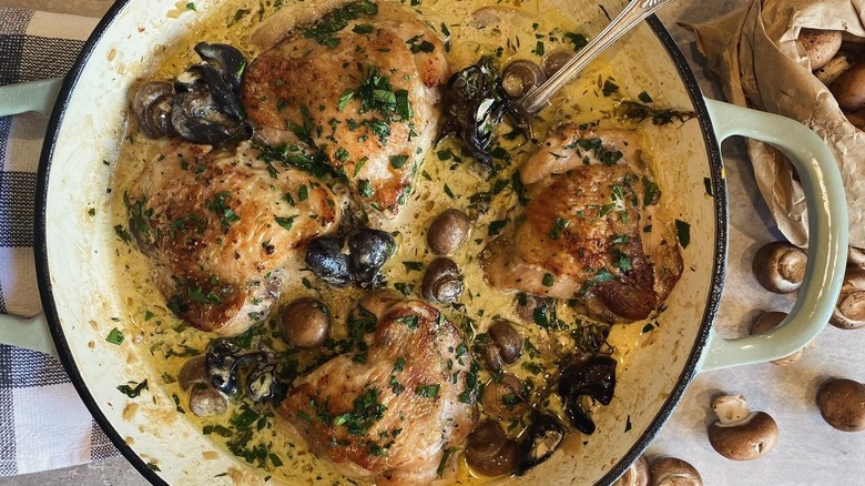 Top view of chicken forestiere served in a large white baking dish