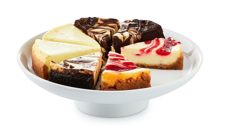 Four types of sliced cheesecake