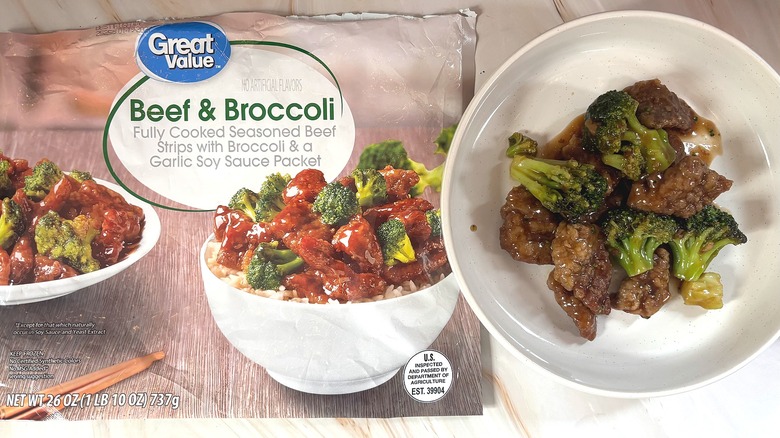 Great Value beef and broccoli in white bowl next to packaging